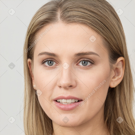 Joyful white young-adult female with long  brown hair and grey eyes