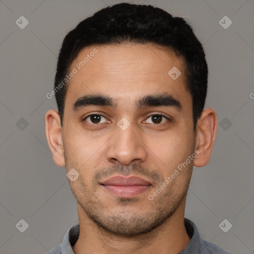 Neutral latino young-adult male with short  black hair and brown eyes