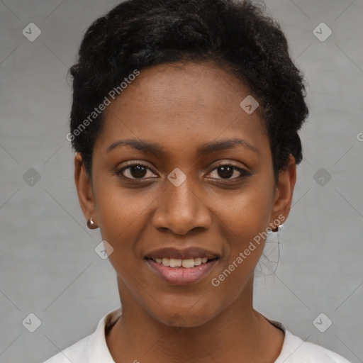 Joyful black young-adult female with short  black hair and brown eyes