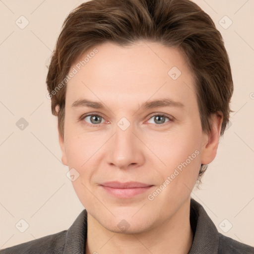 Joyful white young-adult female with short  brown hair and grey eyes