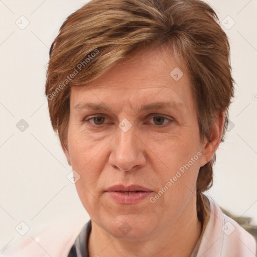 Joyful white adult female with short  brown hair and brown eyes