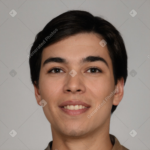 Joyful white young-adult male with short  black hair and brown eyes