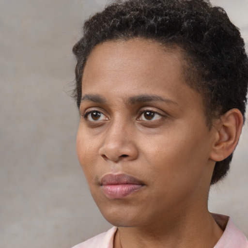 Neutral black young-adult female with short  brown hair and brown eyes