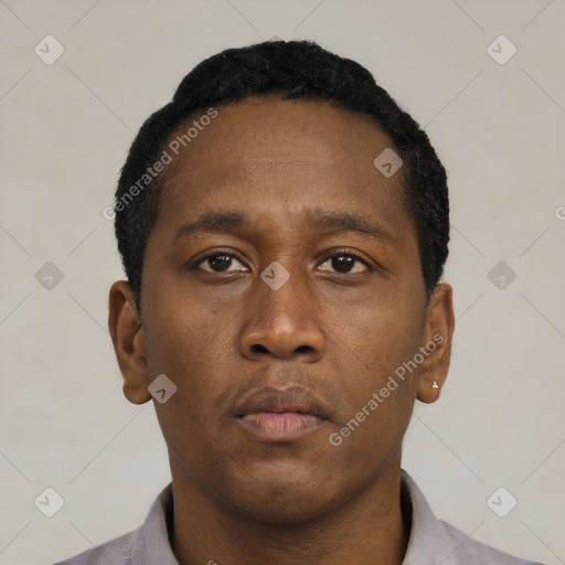 Neutral black young-adult male with short  black hair and brown eyes