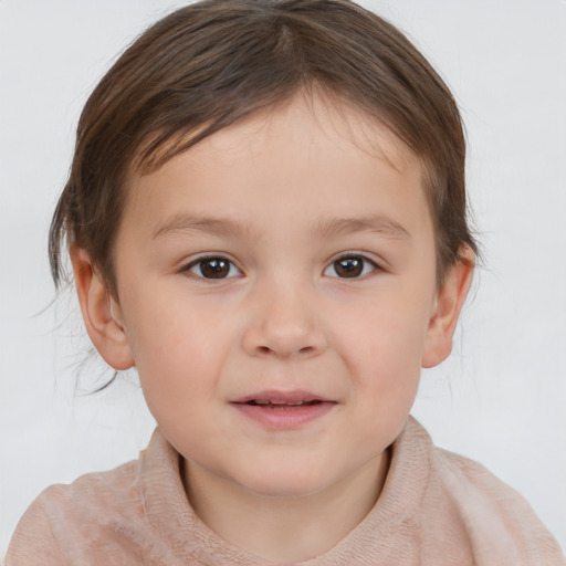 Joyful white child female with short  brown hair and brown eyes