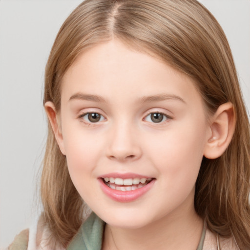 Joyful white child female with medium  brown hair and brown eyes