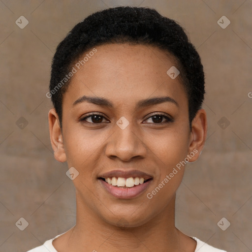 Joyful black young-adult female with short  black hair and brown eyes