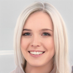 Joyful white young-adult female with long  brown hair and blue eyes