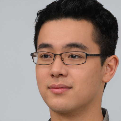 Neutral asian young-adult male with short  black hair and brown eyes