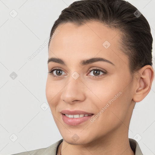 Joyful white young-adult female with short  brown hair and brown eyes