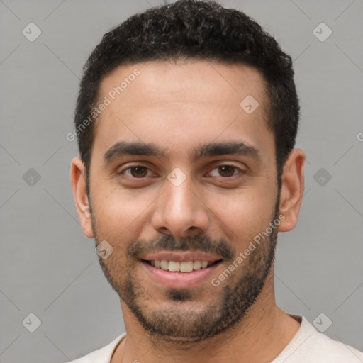 Joyful white young-adult male with short  black hair and brown eyes