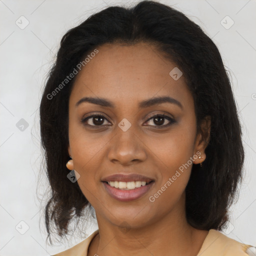 Joyful black young-adult female with medium  brown hair and brown eyes