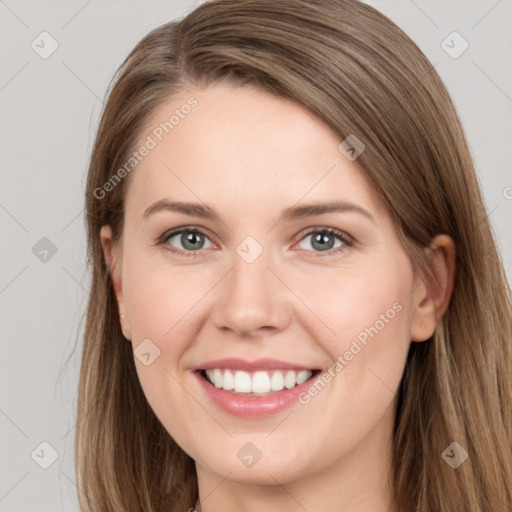 Joyful white young-adult female with long  brown hair and grey eyes