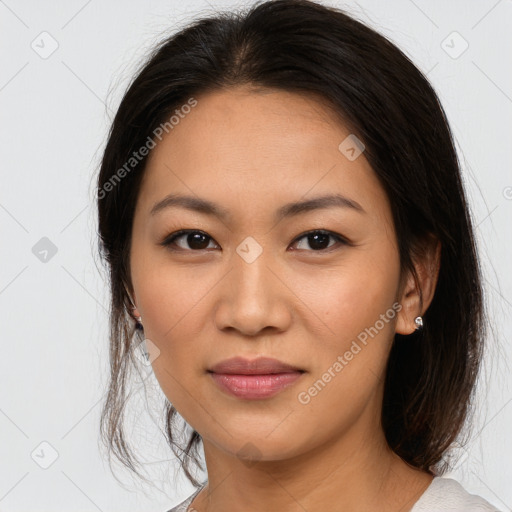 Joyful white young-adult female with medium  brown hair and brown eyes