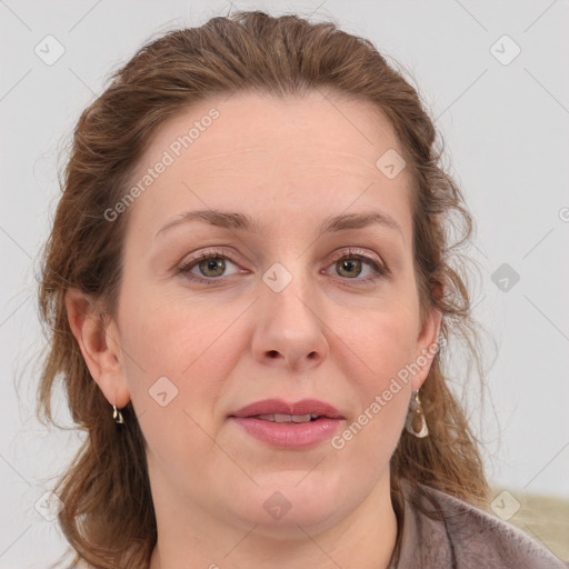 Joyful white adult female with medium  brown hair and grey eyes