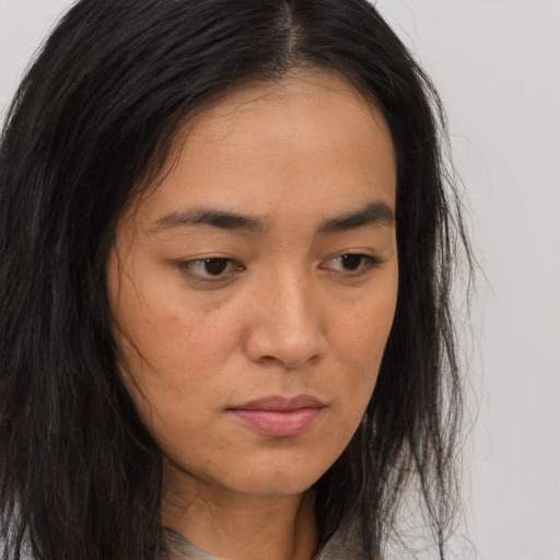 Neutral asian young-adult female with long  brown hair and brown eyes