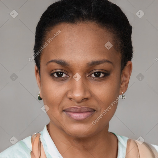 Joyful black young-adult female with short  brown hair and brown eyes