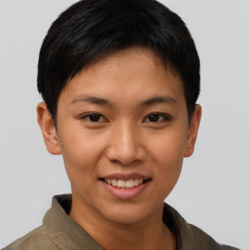 Joyful asian young-adult female with short  brown hair and brown eyes