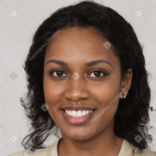 Joyful black young-adult female with medium  black hair and brown eyes