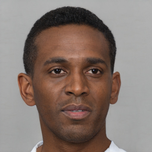 Neutral black young-adult male with short  brown hair and brown eyes