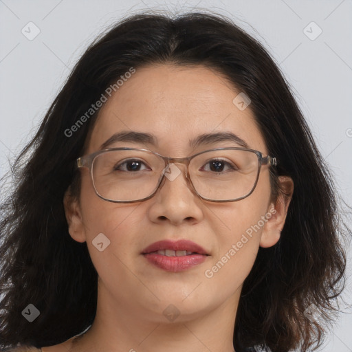 Joyful white adult female with long  brown hair and brown eyes