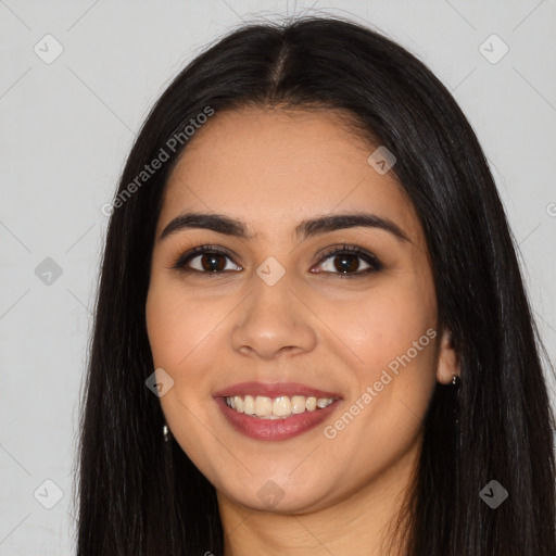 Joyful latino young-adult female with long  black hair and brown eyes