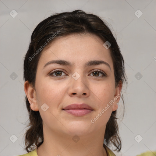 Joyful white young-adult female with medium  brown hair and brown eyes