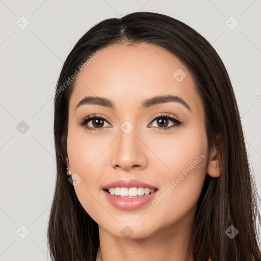 Joyful white young-adult female with long  black hair and brown eyes