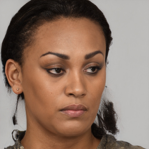 Neutral black young-adult female with short  brown hair and brown eyes