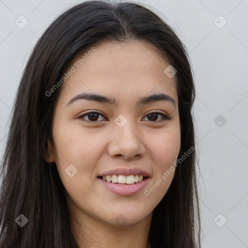 Joyful asian young-adult female with long  brown hair and brown eyes