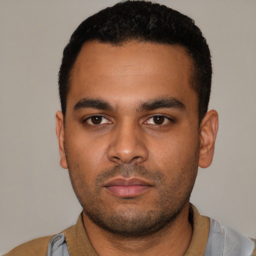 Neutral latino young-adult male with short  black hair and brown eyes