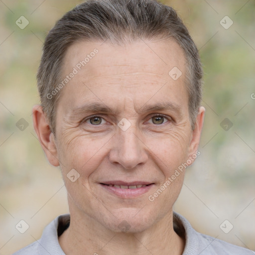 Joyful white middle-aged male with short  brown hair and brown eyes