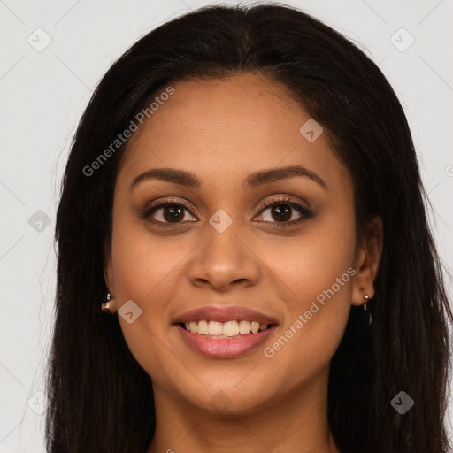 Joyful latino young-adult female with long  brown hair and brown eyes