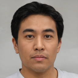 Neutral asian young-adult male with short  black hair and brown eyes