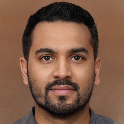 Neutral latino young-adult male with short  black hair and brown eyes