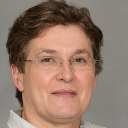 Joyful white middle-aged male with short  brown hair and brown eyes