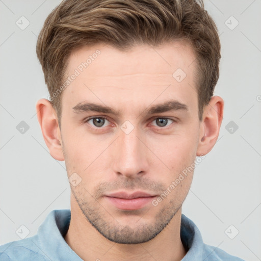 Neutral white young-adult male with short  brown hair and grey eyes