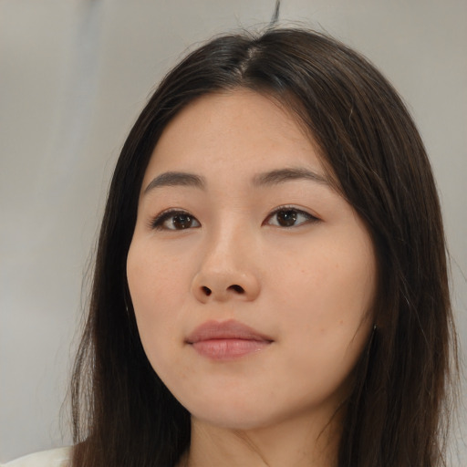 Neutral asian young-adult female with long  brown hair and brown eyes