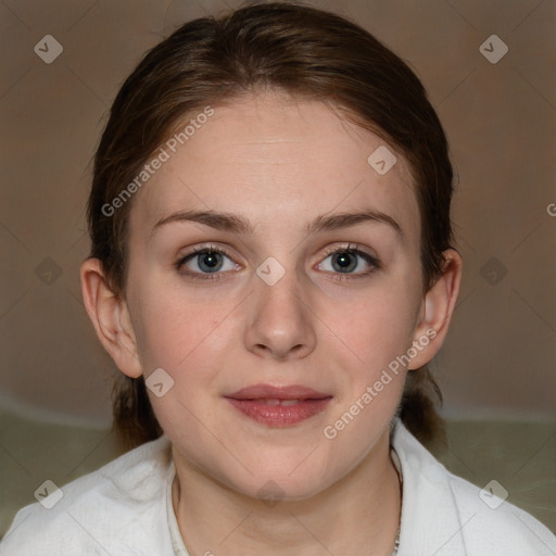 Joyful white young-adult female with medium  brown hair and blue eyes