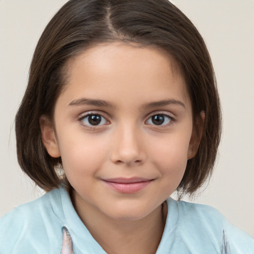 Joyful white child female with medium  brown hair and brown eyes