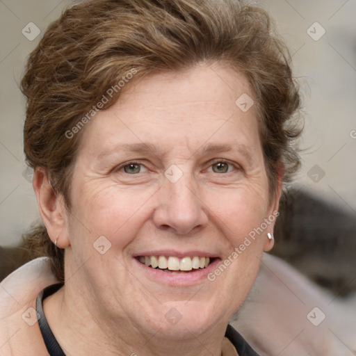 Joyful white adult female with short  brown hair and brown eyes