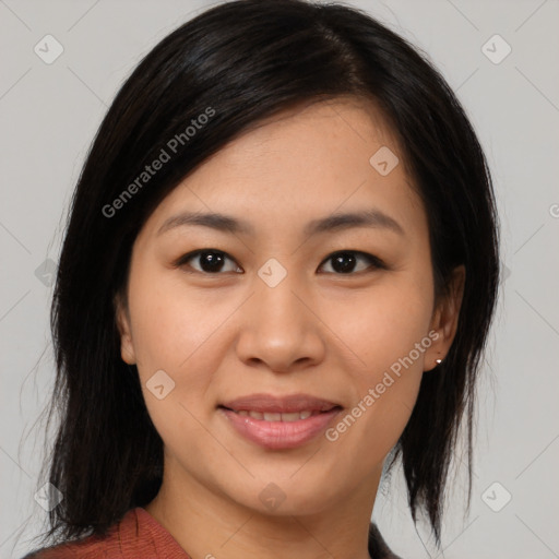 Joyful asian young-adult female with medium  black hair and brown eyes