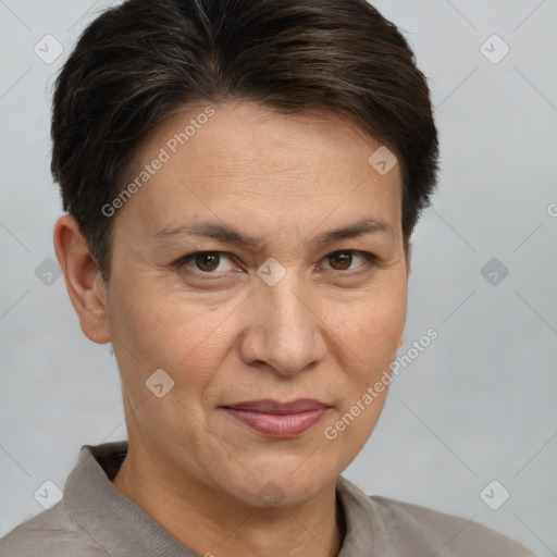 Joyful white adult female with short  brown hair and brown eyes