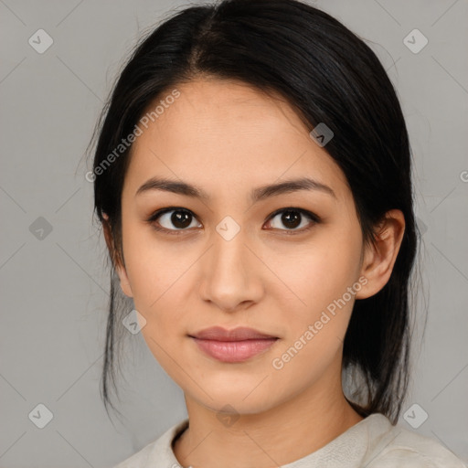 Joyful asian young-adult female with medium  brown hair and brown eyes