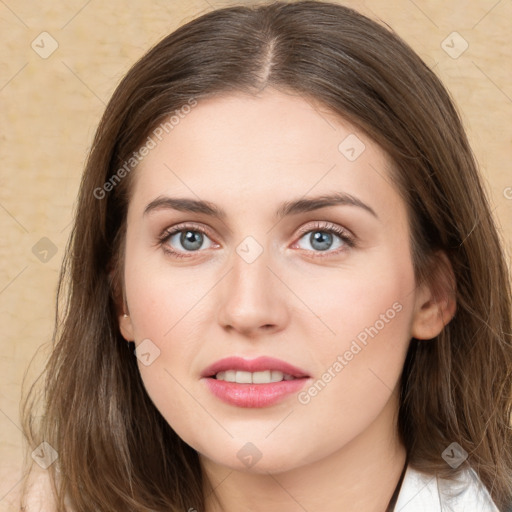 Joyful white young-adult female with long  brown hair and grey eyes