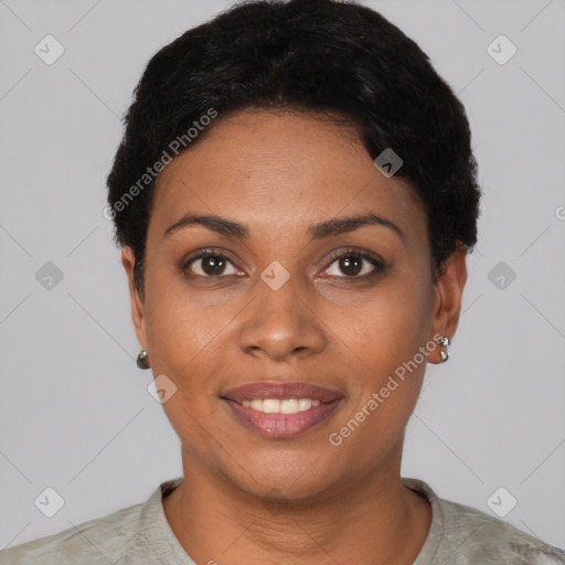 Joyful black young-adult female with short  black hair and brown eyes