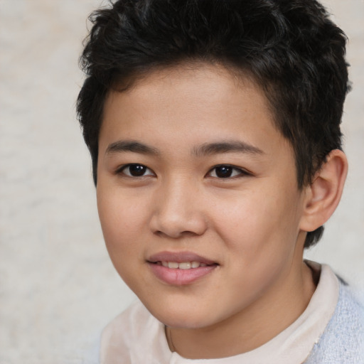 Joyful white child male with short  brown hair and brown eyes