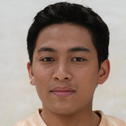 Neutral asian young-adult male with short  brown hair and brown eyes