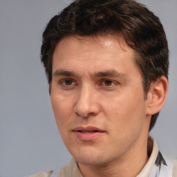 Neutral white adult male with short  brown hair and brown eyes