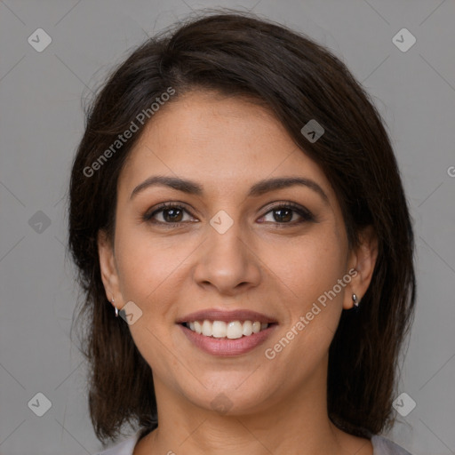 Joyful white young-adult female with medium  brown hair and brown eyes